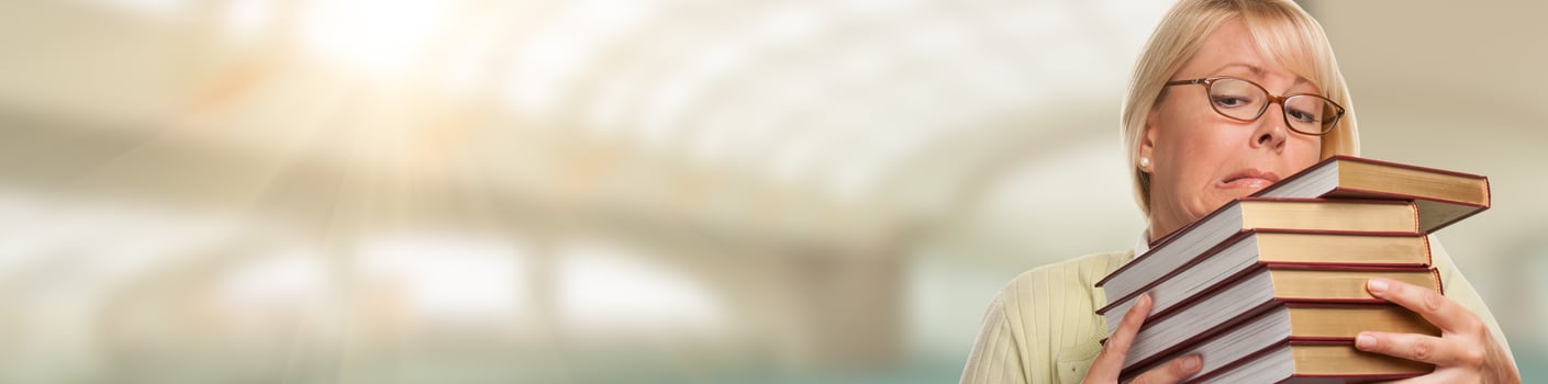 Banner of Beautiful Expressive Student or Businesswoman with Books. photo