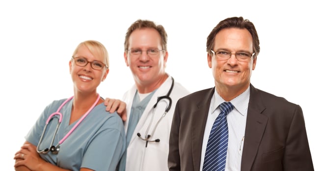 Smiling Businessman with Male and Doctor and Nurse photo