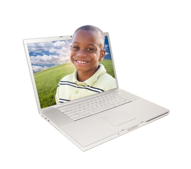 Happy African American Boy in Laptop photo