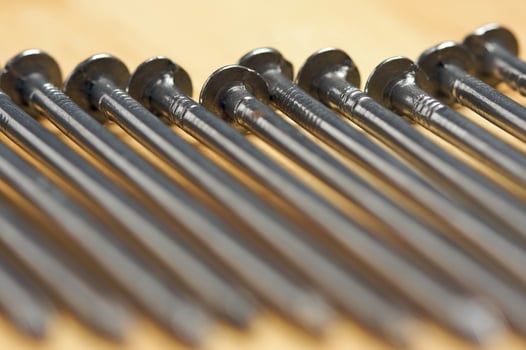 Macro of Nails on Wood photo