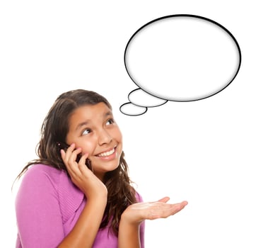 Hispanic Teen Aged Girl on Cell Phone with Blank Thought Bubble photo