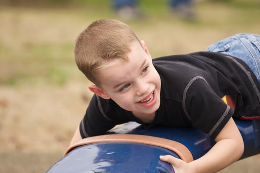 Adorable Child Playing at the Playground photo