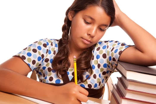 Pretty Hispanic Girl Studying photo