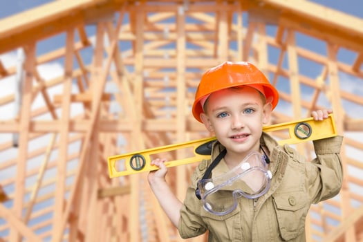 Child Boy Dressed Up as Handyman in Front of House Framing photo