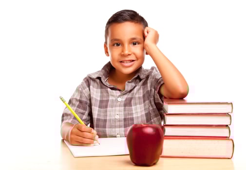 Adorable Hispanic Boy with Books, Apple, Pencil and Paper photo
