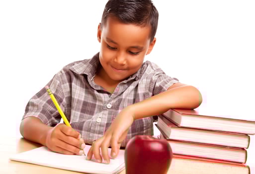 Adorable Hispanic Boy with Books, Apple, Pencil and Paper photo