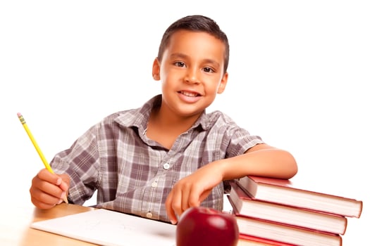 Adorable Hispanic Boy with Books, Apple, Pencil and Paper photo
