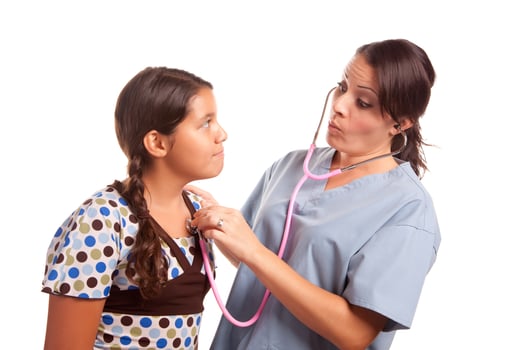 Pretty Hispanic Girl and Female Doctor Isolated photo