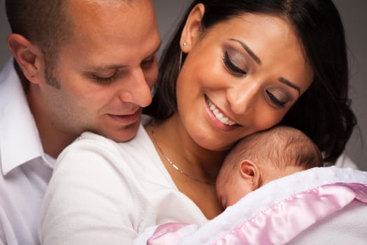 Mixed Race Young Family with Newborn Baby photo