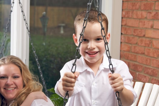 Young Boy Smiles for The Camera photo