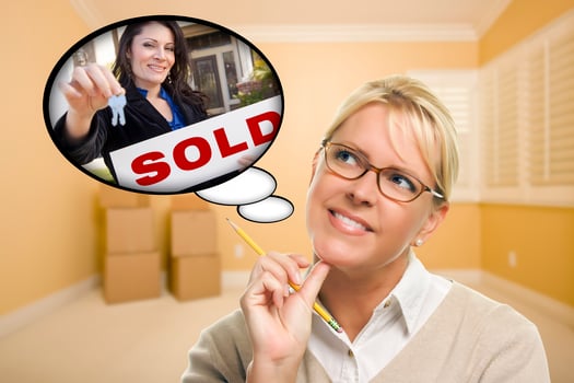 Woman In Empty Room with Thought Bubble of Agent Handing Over New Keys photo