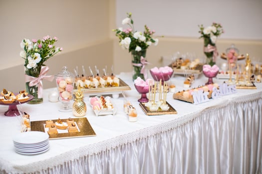 beautifully decorated table with sweet candy bar photo