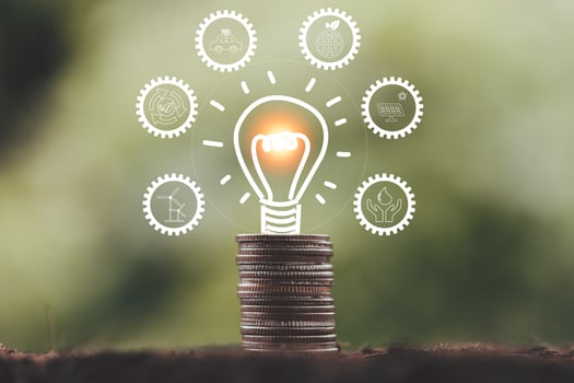 alternative energy, Renewable Energy, saving energy and finance, energy stock investment, lightbulb on coin with eco environment icon. electricity energy source for eco environment. photo