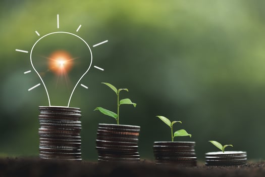 alternative energy, Renewable Energy, saving energy and finance, energy stock investment, tree growing up on stack coin and lightbulb on coin. electricity energy source for eco environment. photo