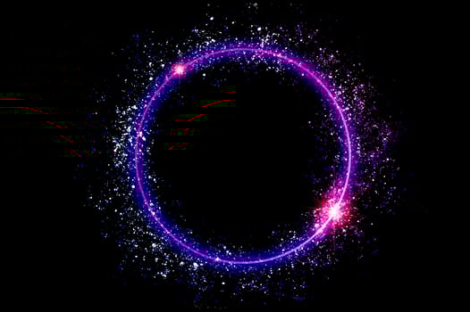 The circular frame is a neon light surrounded by sparkling stars. photo