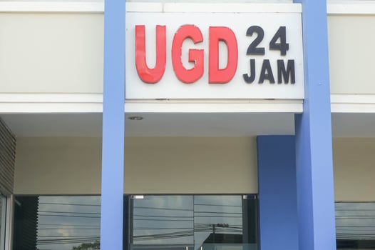 Unit Gawat Darurat or Hospital Emergency Entrance with big red Letters photo