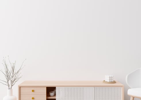Empty white wall. Mock up interior in contemporary style. Close up view. Free space, copy space for your picture, text, or another design. Sideboard, plant. 3D rendering. photo