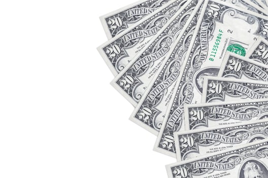 20 US dollars bills lies isolated on white background with copy space. Rich life conceptual background photo