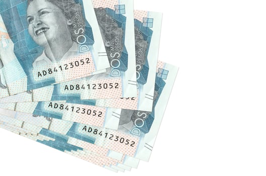 2 Colombian pesos bills lies in small bunch or pack isolated on white. Mockup with copy space. Business and currency exchange photo