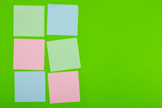 Colorful documents with copy space on a colored background. View from above. For notes and ideas. photo