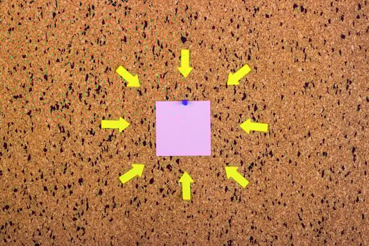 sticky note on cork board, empty space for text photo