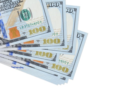 100 US dollars bills lies in small bunch or pack isolated on white. Mockup with copy space. Business and currency exchange photo