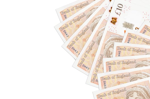 10 British pounds bills lies isolated on white background with copy space. Rich life conceptual background photo