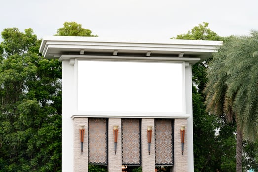 Outdoor sign blank entrance to the village. clipping path photo
