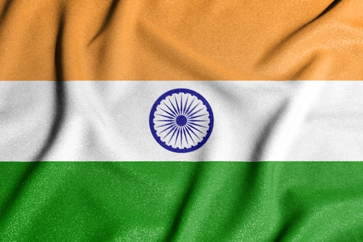 National flag of the India. The main symbol of an independent country. Flag of India. An attribute of the large size of a democratic state. photo
