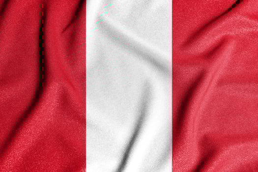 National flag of the Peru. The main symbol of an independent country. An attribute of the large size of a democratic state. Flag of Peru. photo