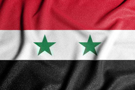 National flag of the Syria. The main symbol of an independent country. Flag of Syria. An attribute of the large size of a democratic state. photo