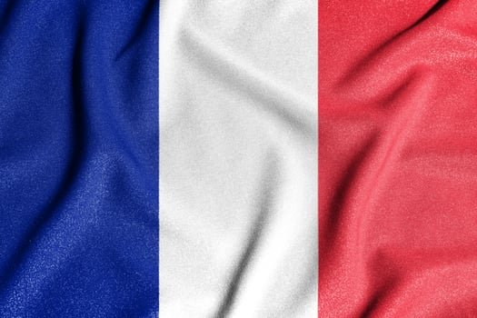 National flag of the France. The main symbol of an independent country. Flag of France. An attribute of the large size of a democratic state. photo