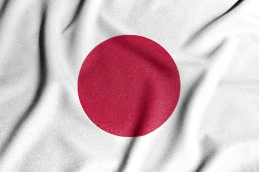 National flag of the Japan. The main symbol of an independent country. Flag of Japan. An attribute of the large size of a democratic state. photo