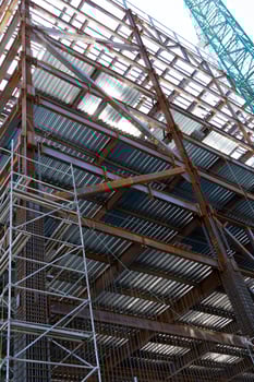 man welding steel on a girder at heights, building structure, mexico guadalajara photo