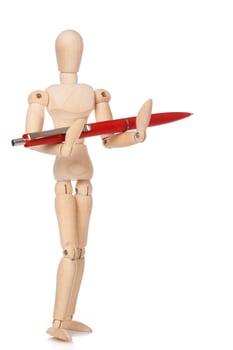 Small wooden dummy and ballpoint pen photo