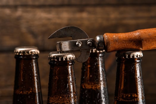 Bottles with beer and vintage opener photo