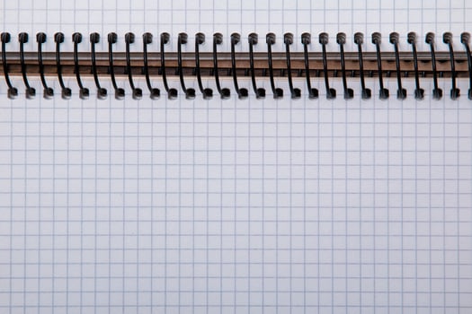 Notepad on wooden surface photo