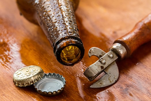 Vintage opener and beer photo