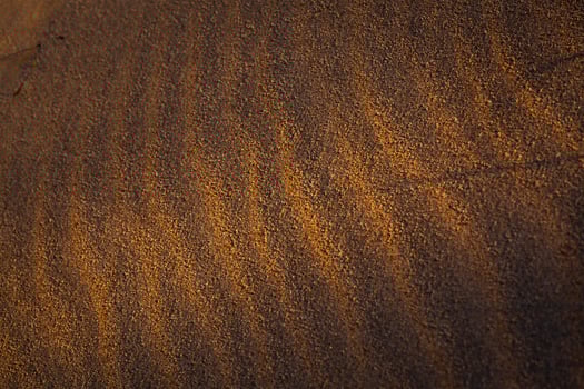 Baltic Sea Coast With Pebbles And Ice at Sunset photo