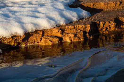 Baltic Sea Coast With Pebbles And Ice at Sunset photo