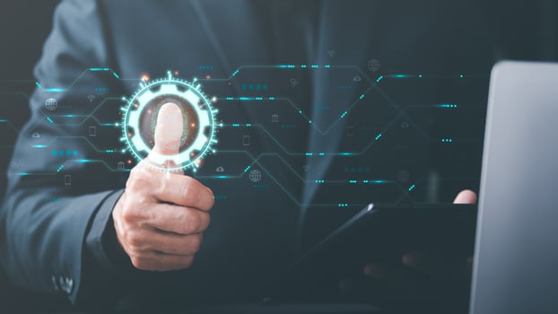 Cybersecurity Management with Online Authentication Technology , A businessman scans his fingerprints. to login through encryption and through authorization and authentication from the database photo