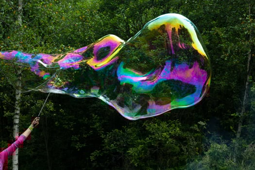 Big bubble. Transparent soap film. Details of holiday. photo