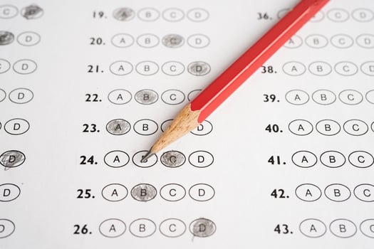 Answer sheets with pencil drawing fill to select choice, education concept. photo