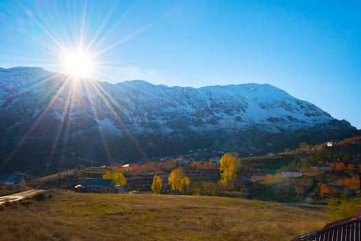 snow and sunset in high mountains photo