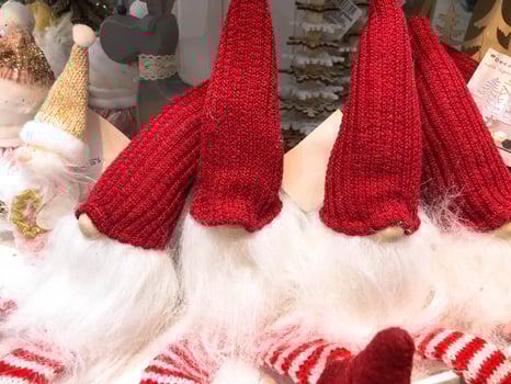 Concept celebration winter seasonal with two red Christmas gnome ornament relax together, handmade stuffed toy crochet from yarn wear long hat, white beard so cute for decoration dec festival season photo