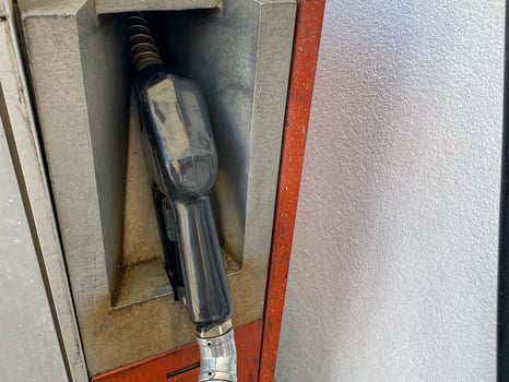 Filling colorful guns at a gas station for refueling a car with fuel, gasoline, diesel photo