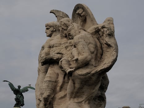 Statue of Sant'Angelo bridge during sunny day in Rome photo
