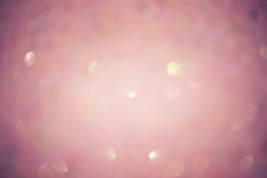 Pink glitter background defocus light. Blurred pink background with defocus. photo