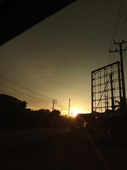 electric cable tower golden sunset silhouette photo