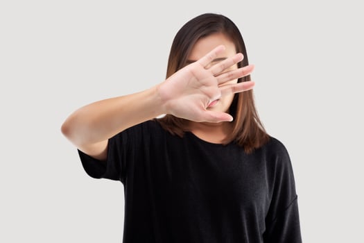Say no. Asian woman showing her denial photo